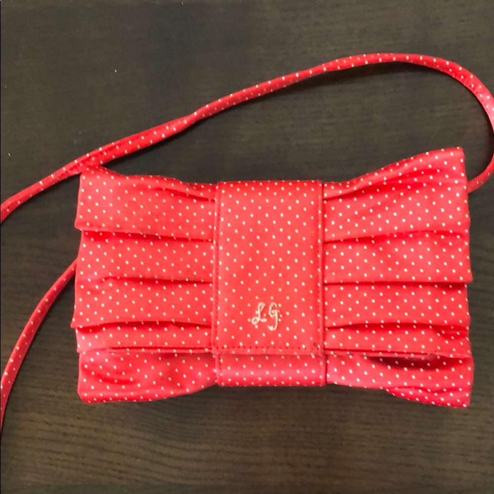 Lulu Guinness red clutch with removable strap